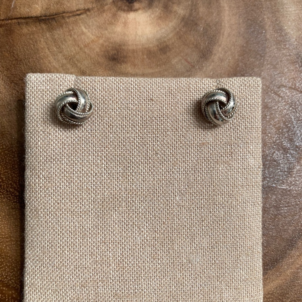 Love knot earrings with beaded edge.  Each earring back stamped 925.
